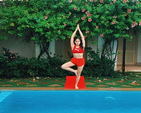 Sara Ali Khan Does Yoga By Swimming Pool
