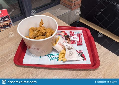 Bucket Of Fried Chicken Hot Wings French Fries Two Cup With Pepsi For