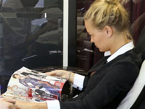 Lara Bingle Spotted Checking Out Kyly Clarke In Magazine The Courier Mail