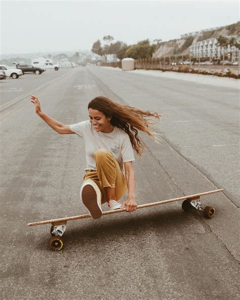 Premium Photo Skater Girl In Denim Is Riding Her Longboard In The