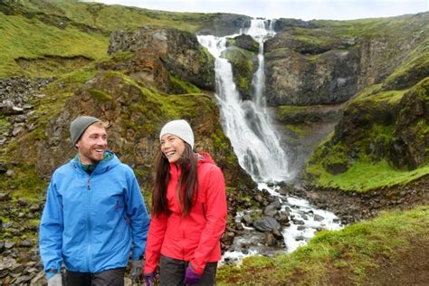 Hiking Active Couple Fun By Waterfall Iceland Stock Image Image Of