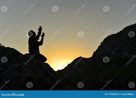 Man Praying On Mountain Stock Image Image Of Hills 119559375