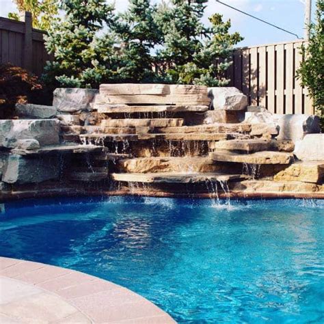 53 Spectacular Pool Waterfall Ideas To Transform Your Oasis