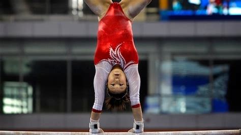 Gymnast Performs A Hair Raising Routine
