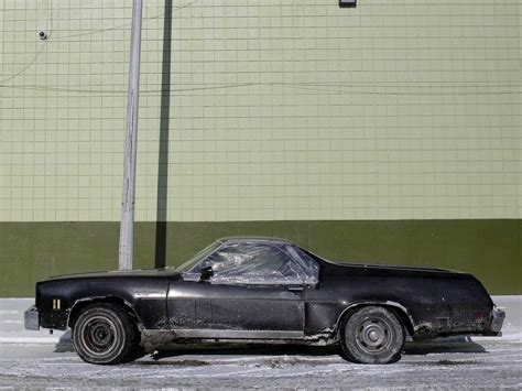 20 Photos Of Cars And Dealerships In Detroit That Were Left Behind