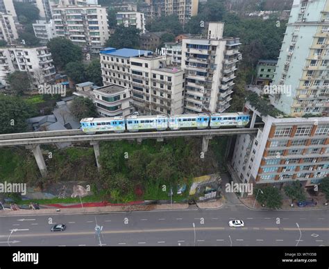 A Subway Train Of Chongqing Light Rail Line Arrives At The Liziba