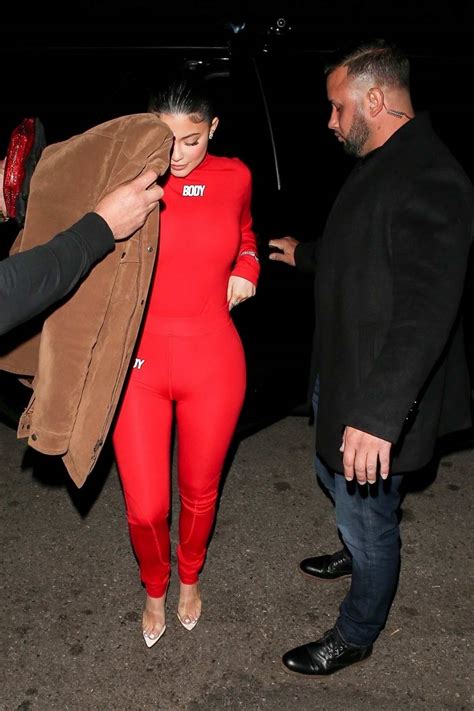 Kylie Jenner Shows Off Her Curves In A Red Jumpsuit As She Arrives At The Nice Guy In West