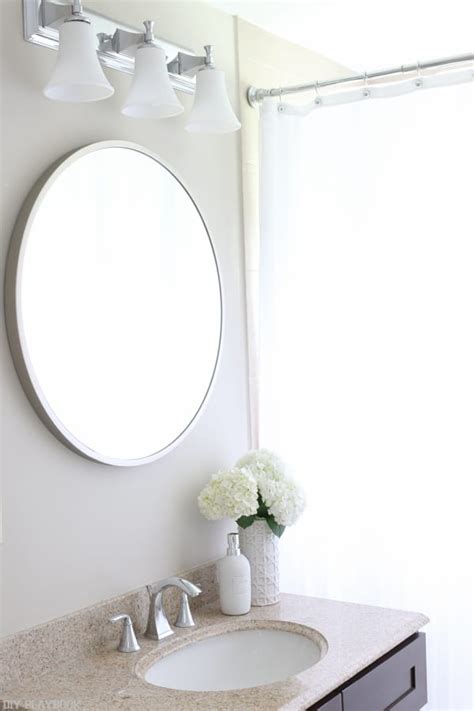 The circular shape takes the mirror from functional to decorative, with a host of frame options, from sleek and chic to vintage and brassy. Bathroom Lighting Over Round Mirror - Home Sweet Home ...