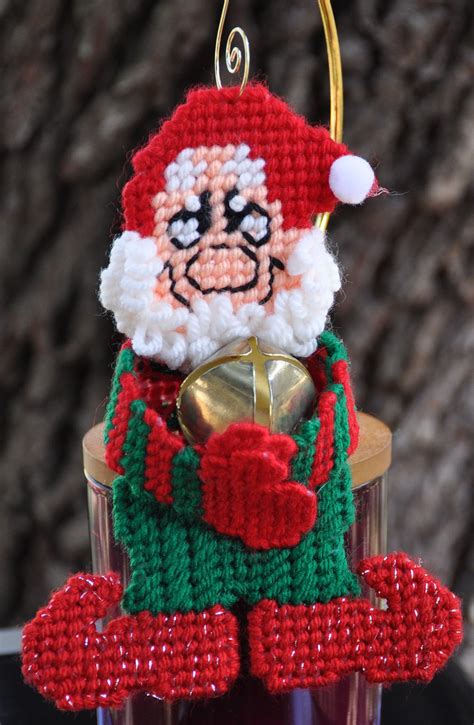 elf hug a bell ornament plastic canvas ornaments plastic canvas patterns plastic canvas designs