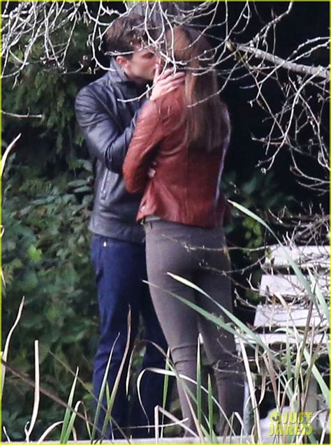 Jamie Dornan Dakota Johnson Kiss In The Woods For Fifty Shades Of Grey Reshoots Photo