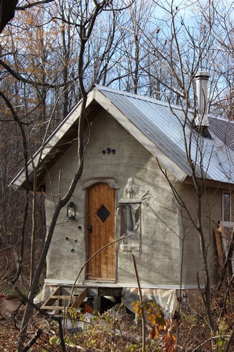 On the mountain side, the soil was excavated, and this soil was then dumped to the slope side of the mountain to make a terrace; Load Bearing Straw Bale Cabin - The Sustainable Home