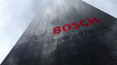 Robert Bosch Gmbh Logo On A Skyscraper Facade Reflecting Clouds