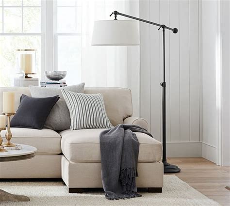 Illustration 2 shows how preferable two matched floor lamps flank a sofa. Chelsea Sectional Floor Lamp | Pottery Barn