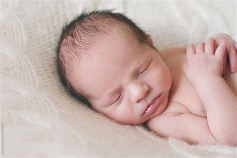 Headshot Portrait Of A Sleeping Newborn Baby By Stocksy Contributor