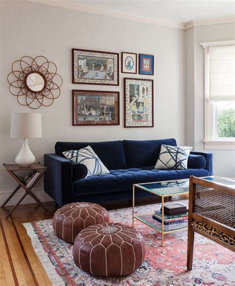 Yes, they can still get dirty, but the dark, muted blue doesn't show it. living room inspo | Velvet sofa living room, Blue sofa living