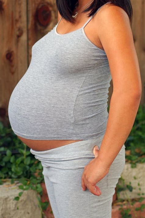 Nine Month Pregnant Belly In Gray Stock Image Image Of Curvy Belly