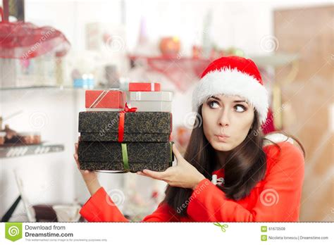 Curious Christmas Girl With Presents In T Shop Stock Photo Image