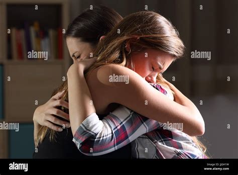 Adults Embrace Hugging Unhappy Hi Res Stock Photography And Images Alamy