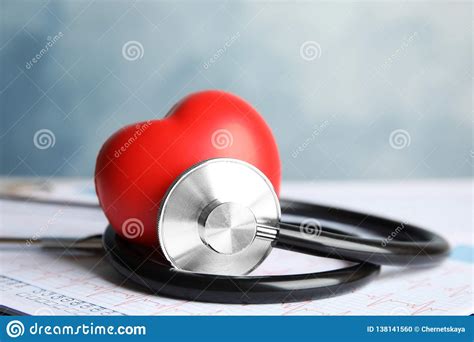 Stethoscope Red Heart And Cardiogram On Table Stock Photo Image Of