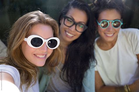 Three Women With Glasses On Smiling By Stocksy Contributor Jovo