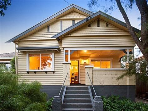 Exterior house colors that will make you want to paint in 2021. Cream White and Grey Exterior Colour Scheme | House ...