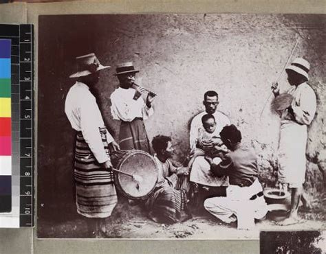 Group Of Musicians Playing Traditional Instruments At Ceremony Probably Circumcisio African