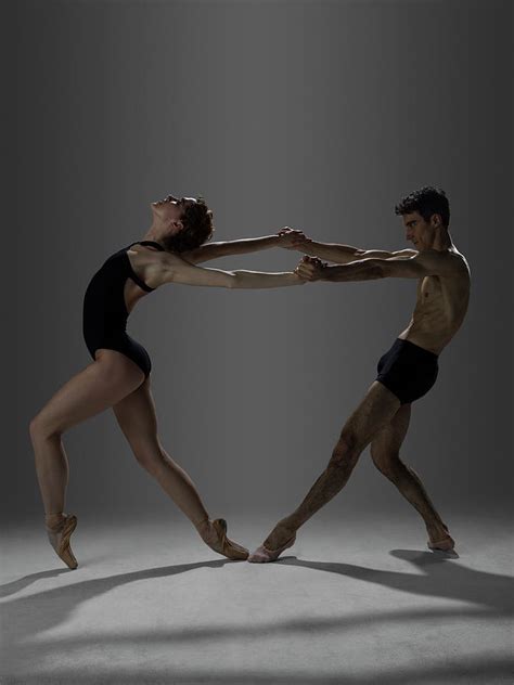 two ballet dancers arch on point by nisian hughes