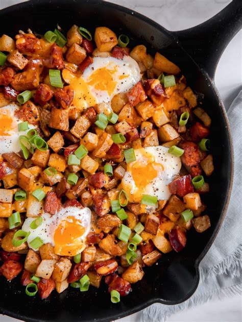this breakfast skillet with super flavorful chorizo crispy potatoes baked eggs and cheddar c