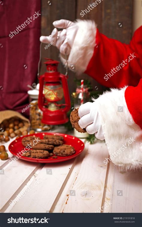 Santa Claus Takes Milk And Cookies Stock Photo 219191818