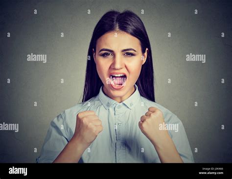 Angry Woman Screaming With Fists Up In Air Stock Photo Alamy
