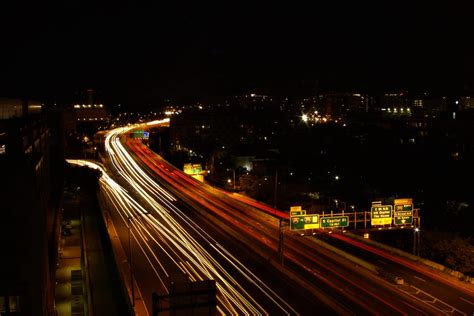 Panning Photography Of Vehicles On Road At Night · Free Stock Photo