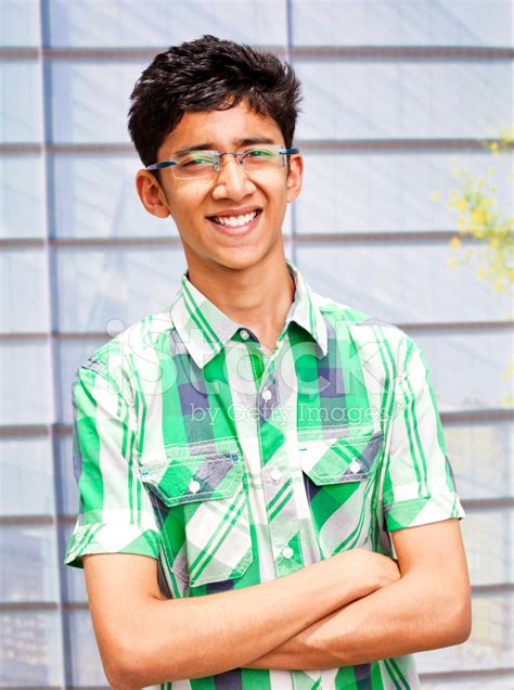 One Cheerful Asian Indian Teenager Standing Outdoor Portrait Stock
