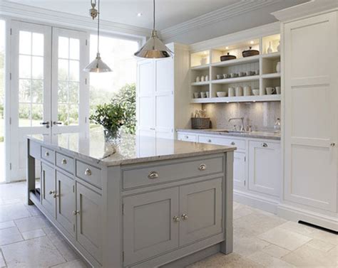 Gray is a wonderful neutral paint color option. The Psychology of Why Gray Kitchen Cabinets Are So Popular | Home Remodeling Contractors ...