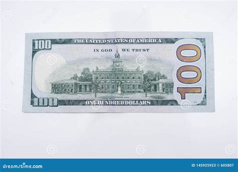 One Hundred Dollar Bill Paper Clipped To Yellow Lined Paper Royalty