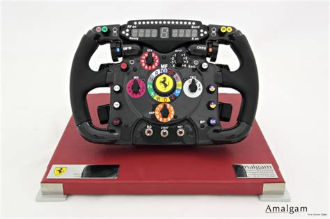 This is an amalgam fine models 1:4 scale steering wheel for the ferrari f10 as driven by fernando alonso and felipe massa during the 2010 season. 2011 Ferrari 150º Italia Replica Steering wheel. F1 steering wheel