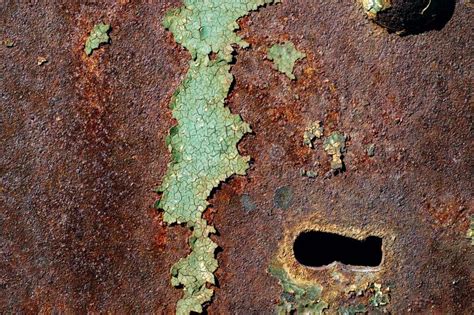 Texture Of Rusty Iron Cracked Green Paint On An Old Metallic Surface