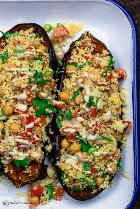 easy stuffed eggplant recipe with tender roasted eggplant and a simple vegan mediterranean st