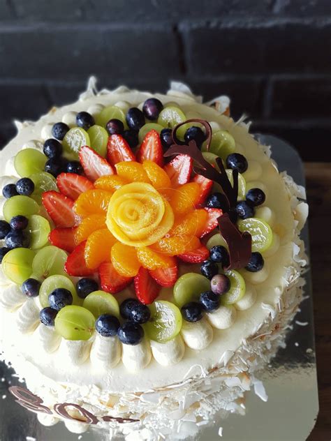 Embroider a cake with gushers look pretty darn great sitting atop some frosting. Fruit Flan Birthday Cake - Bloominghills