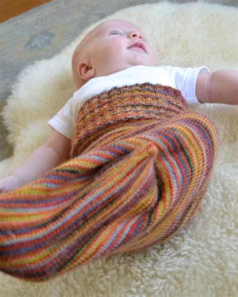 These knitted baby cocoons will be perfect for you! Baby Cocoon, Snuggly, Sleep Sack, Wrap Knitting Patterns ...