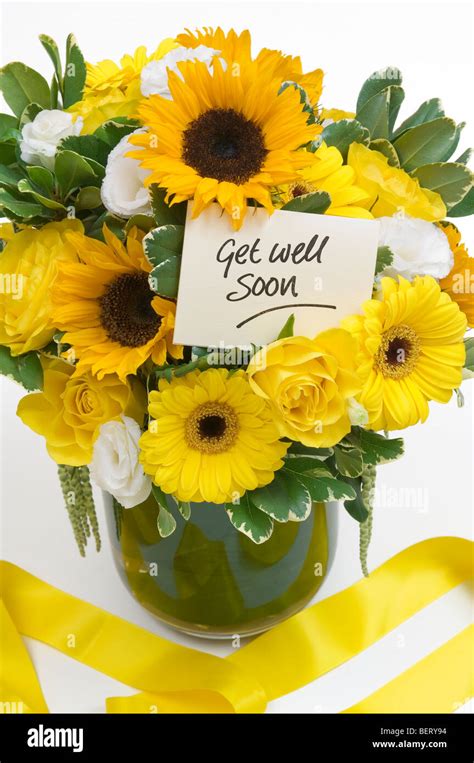 A Vase With Flowers And A Get Well Soon Card Stock Photo Alamy