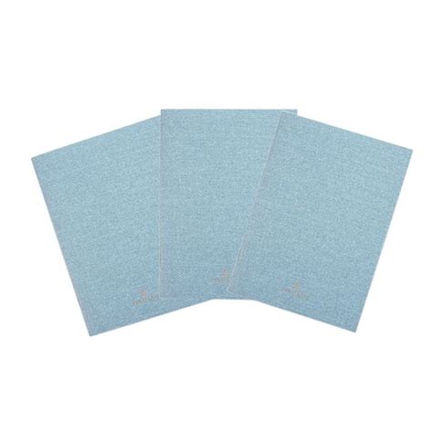 Four Pieces Of Blue Paper On A White Background