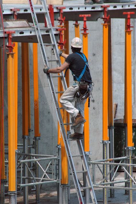 Construction Ladder Construction Worker Climbing A Ladder Sponsored