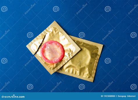 Condom In Wrapper Pack Is Tear Open Stock Photo Image Of Aids Packaging