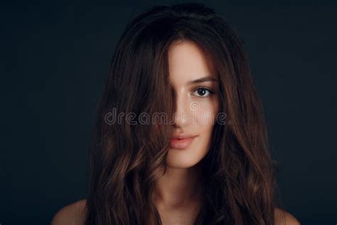 Portrait Of Beautiful Young Brunette Woman With Healthy Hair Stock