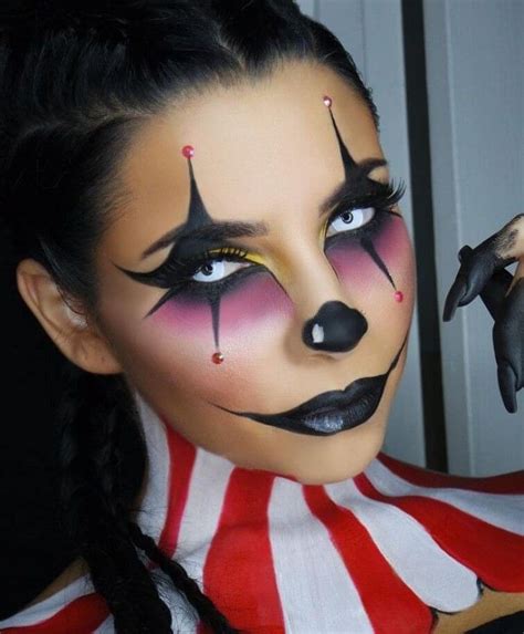 Halloween Face Paint Young Woman With Clown Makeup In Black And