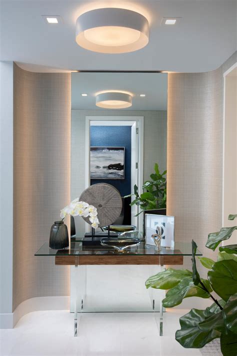 Modern Foyer with Glass Table and Recessed Lighting | HGTV