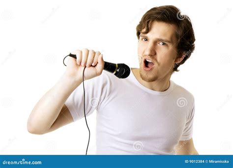 Hombre Que Canta En El Micrófono Foto De Archivo Imagen De Cara Loco 9012384