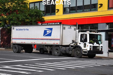 United States Postal Service Usps Mack Truck Trailer In Manhattan New York City A Photo