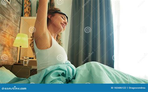 Beautiful Blond Woman Stretching While Waking Up Stock Photo Image Of