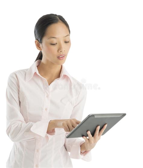 Businesswoman Using Digital Tablet while Sitting on Office Chair Stock ...